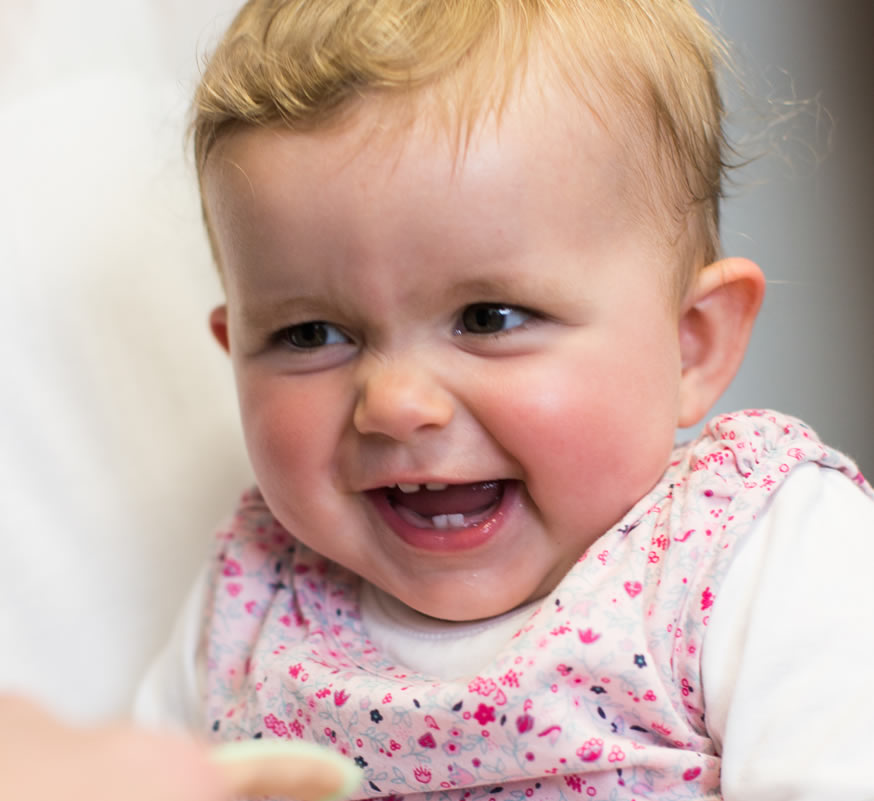 smiling baby with healthy teeth